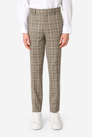 Person wearing tan checkered pants on a white background