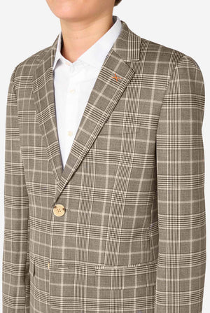 Plaid blazer worn by a person on a white background
