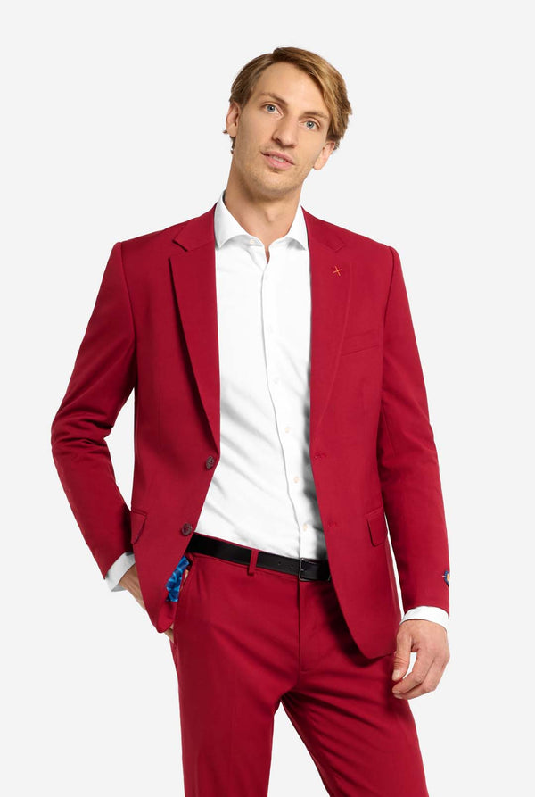 Man wearing a red suit with a white shirt on a white background