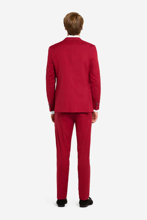 Person wearing a red suit on a white background. View from the back