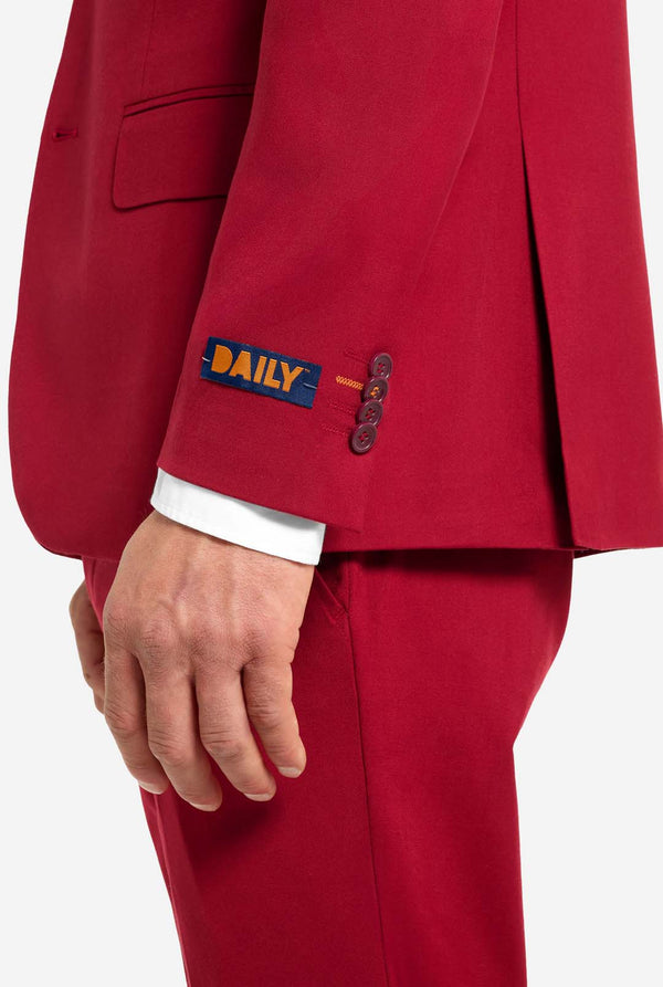 Red suit jacket with 'DAILY' logo on a white background