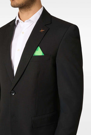 Black suit with a white shirt and green pocket square on a plain background