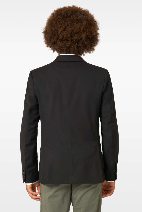 Person wearing a black blazer from behind on a white background. View from the back
