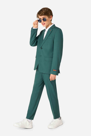 Teen boy wearing a stylish dark green suit with a white dress shirt, smiling confidently. Perfect formal outfit for boys' special occasions, weddings, and parties. Full body image and boy wearing sunglasses.