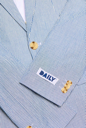 Teen wearing Casual suit with Seer Sucker design, close up