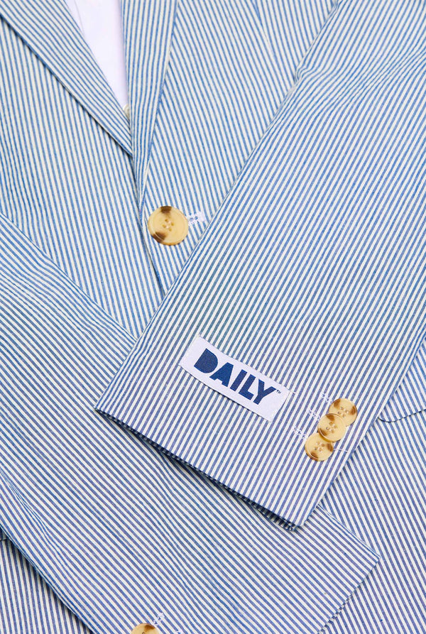 Teen wearing Casual suit with Seer Sucker design, close up