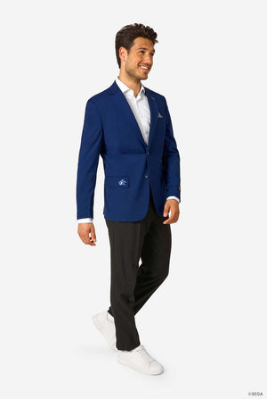 Man wearing a blue blazer, white shirt, black pants, and white shoes on a white background. Full body image