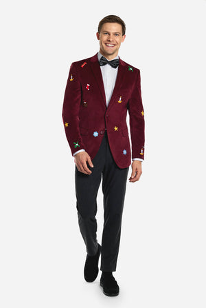 Man wearing burgundy red velvet Christmas blazer with Christmas icons