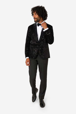 Man wearing a black sequin blazer on a white background