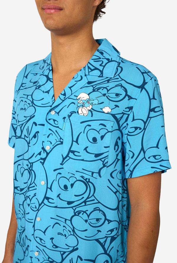 Blue shirt with Smurfs character pattern worn by a person