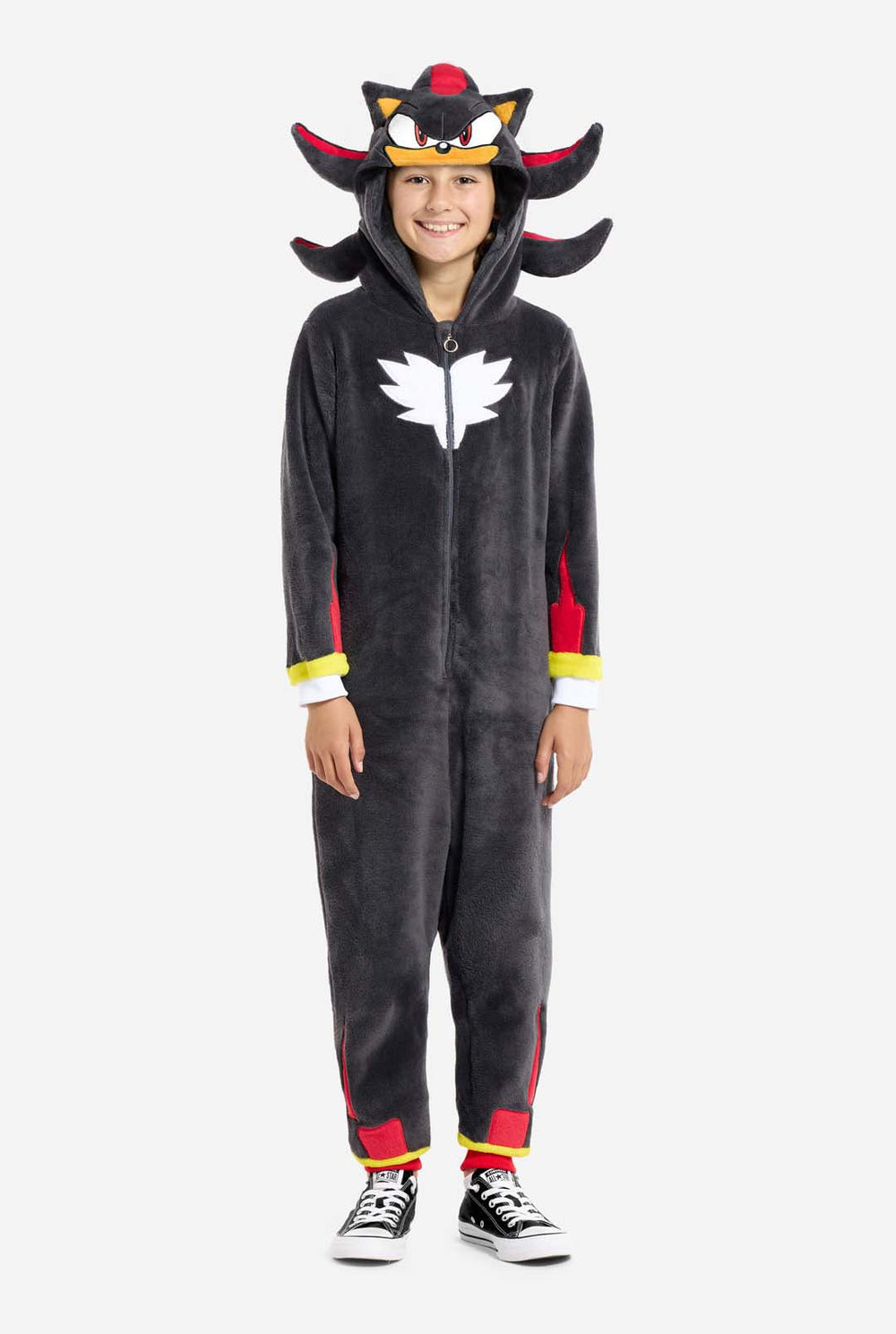 Child wearing a black Shadow onesie on a white background
