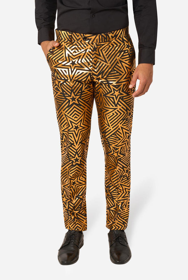 Person wearing black shirt and patterned pants on a white background