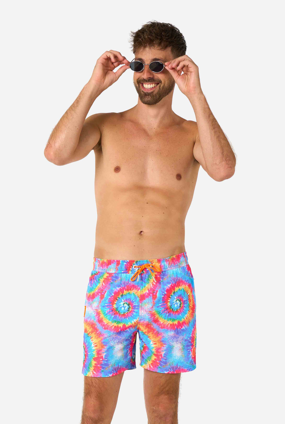 Tie-dye swim shorts with a colorful spiral pattern on a white background