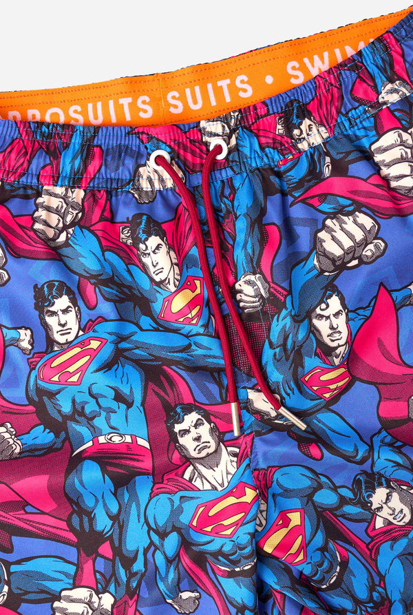 Superman-themed swimsuit with character print on orange background