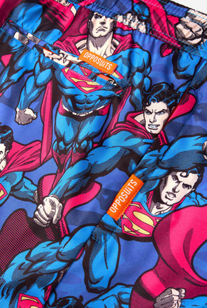 Superman-themed fabric with colorful design and 'Opposuits' branding.