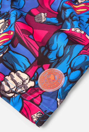 Superhero-themed fabric on a white background