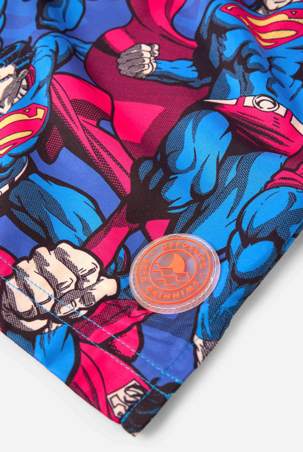 Superhero-themed fabric on a white background