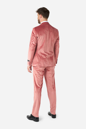 Man wearing pink velvet tuxedo, view from the back