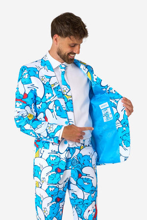 Man wearing a blue Smurf-themed suit on a white background