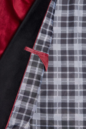 Man wearing burgundy red dinner jacket blazer, close up inside