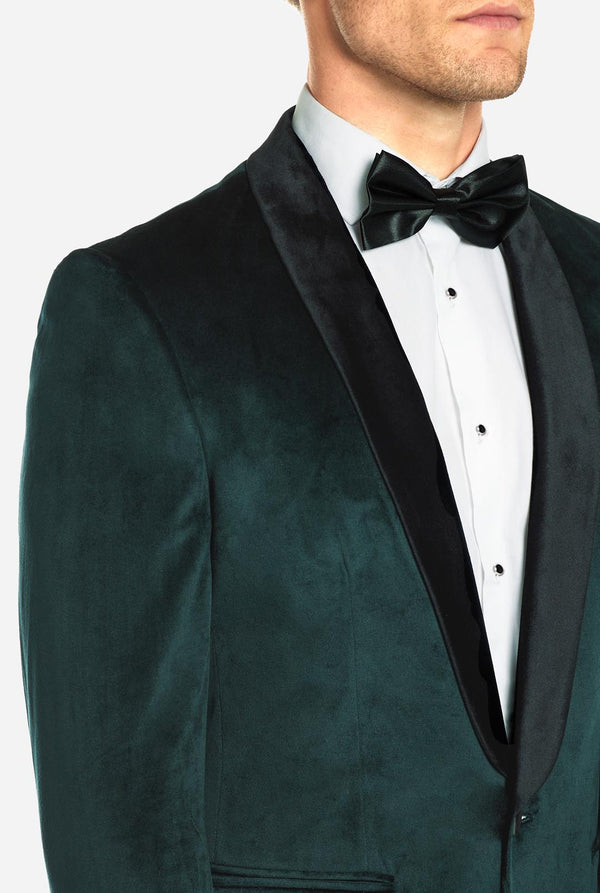 Man wearing dark green dinner jacket blazer