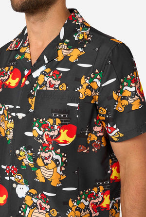Black shirt with colorful Bowser character pattern worn by a person