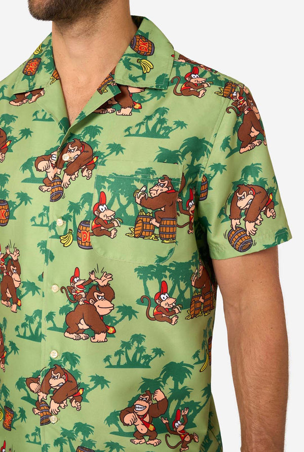 Green shirt with Donkey Kong pattern worn by a person