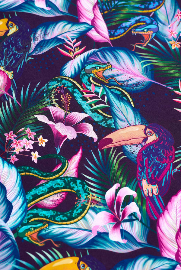 Colorful tropical pattern with birds, flowers, and leaves on a dark background