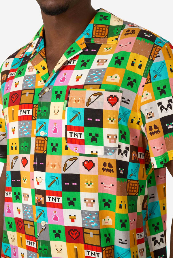 Colorful shirt with pixelated design featuring various Minecraft symbols and icons.