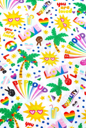 Image of a white Hawaiian shirt with a rainbow pride print, Print consists of peace symbols, hearts, palm trees and other icons. Print close up.