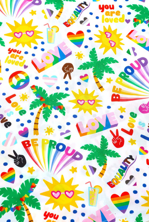 Image of a white Hawaiian shirt with a rainbow pride print, Print consists of peace symbols, hearts, palm trees and other icons. Print close up.