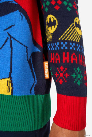 Close-up of a colorful sweater with superhero design and 'SuperSkins' branding.