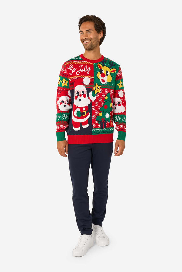 Man wearing a festive Christmas sweater with Santa Claus design on a white background. Full body image
