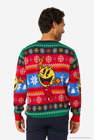 Person wearing a colorful sweater with a Pac-Man character design on a white background