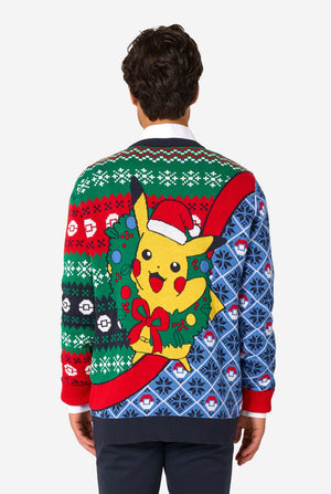 Person wearing a colorful Christmas-themed sweater with Pikachu on the back. View from the back