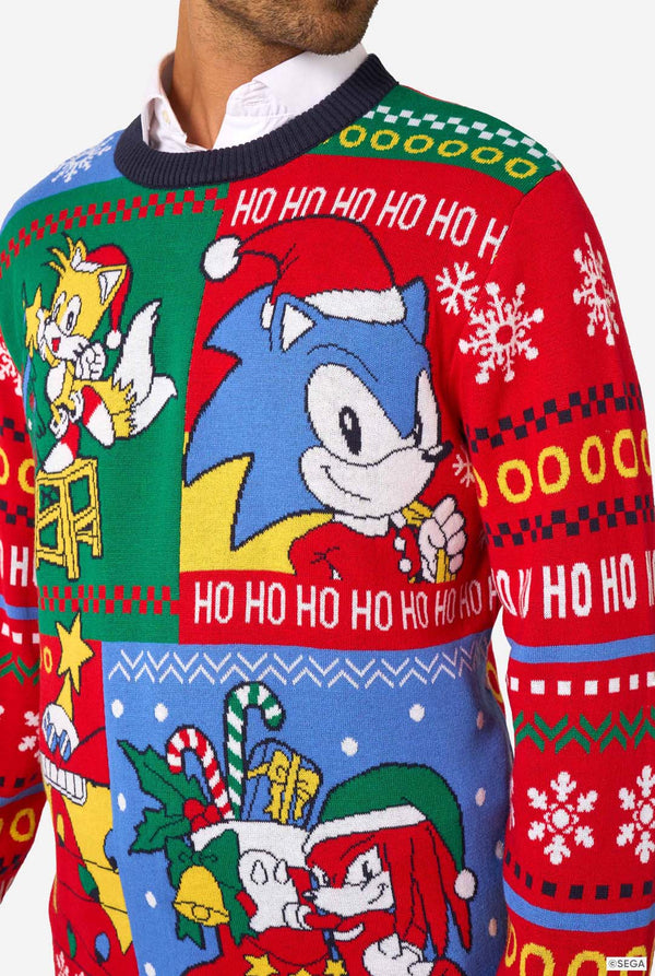 Colorful Christmas-themed sweater with Sonic characters and festive patterns.