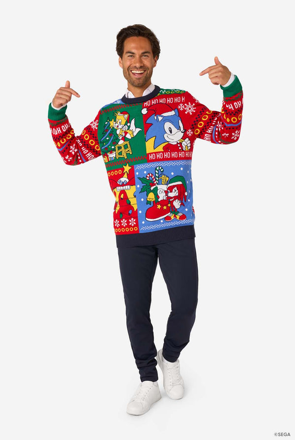 Man wearing a colorful Christmas-themed sweater with Sonic characters on a white background. Full body image