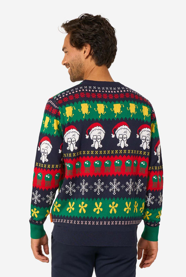 Man wearing a colorful Christmas sweater with Santa Claus design on a white background. View from the back