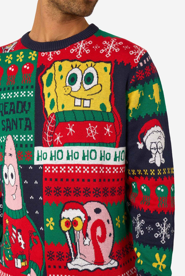 Christmas-themed sweater with Spongebob character designs on a white background
