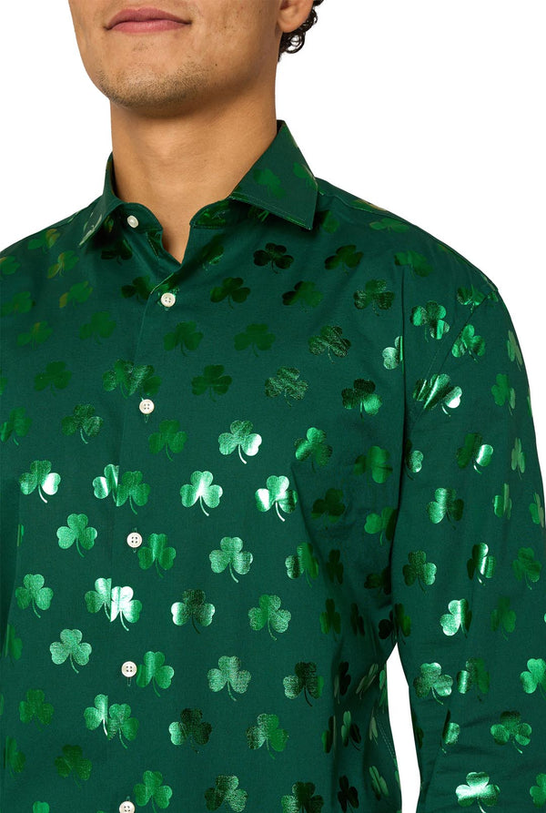 Green shirt with shamrock pattern worn by a person