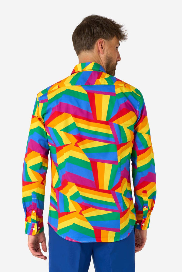 Man wearing a colorful geometric-patterned shirt on a white background, view from the back.