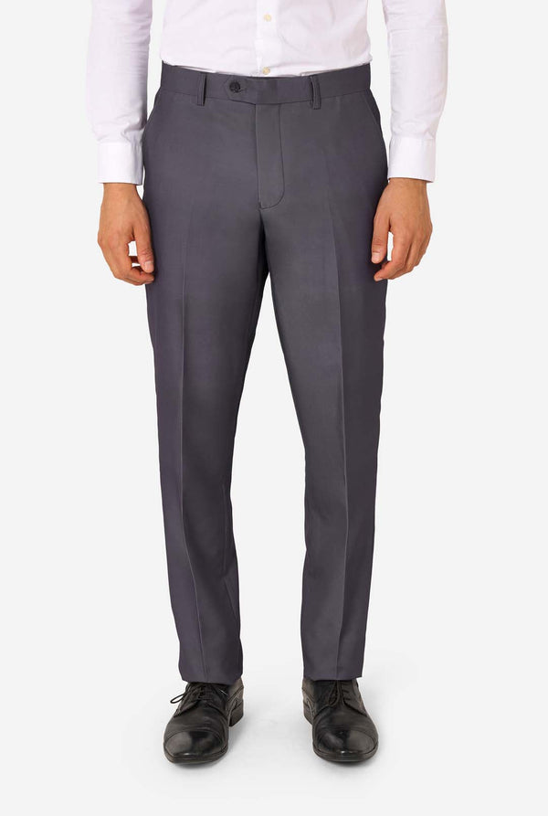 Gray dress pants worn with a white shirt and black shoes on a white background