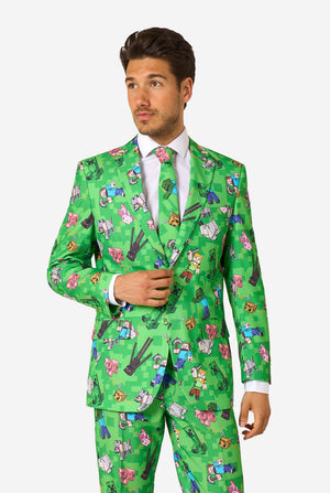 Man wearing a green patterned Minecraft suit on a white background