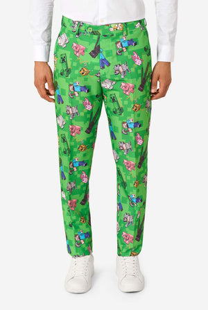 Green Minecraft pants with colorful pattern worn by a person on a white background