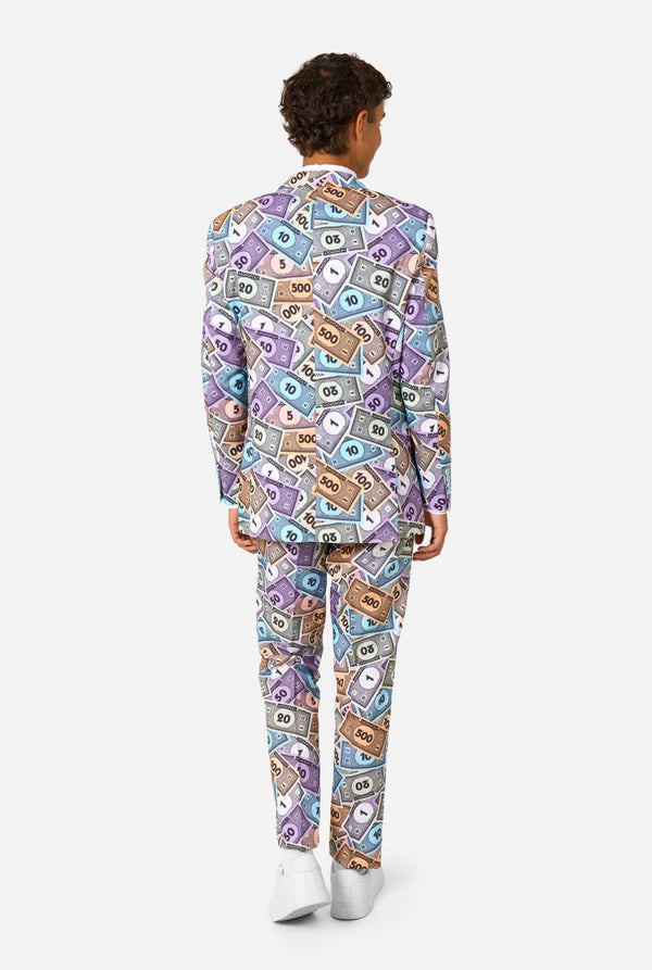 Person wearing a colorful suit with money bill pattern on a white background. View from the back