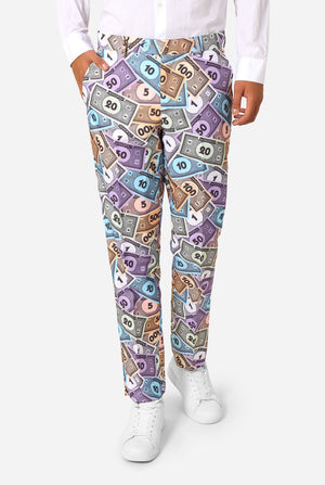 Person wearing colorful dollar bill patterned pants on a white background