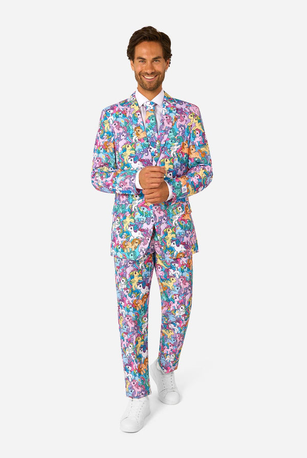 Man wearing a colorful My Little Pony floral suit on a white background. Full body image.