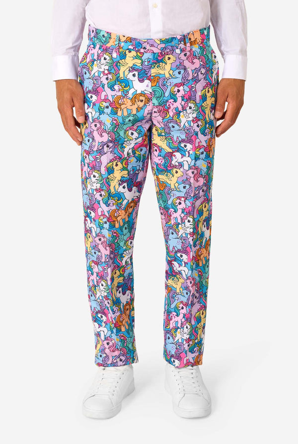 Colorful My Little Pony patterned pants worn by a person on a white background
