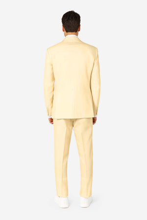 Man wearing a light yellow suit on a white background. View from the back