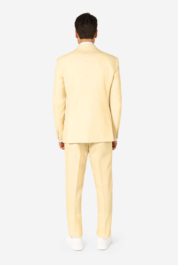 Man wearing a light yellow suit on a white background. View from the back